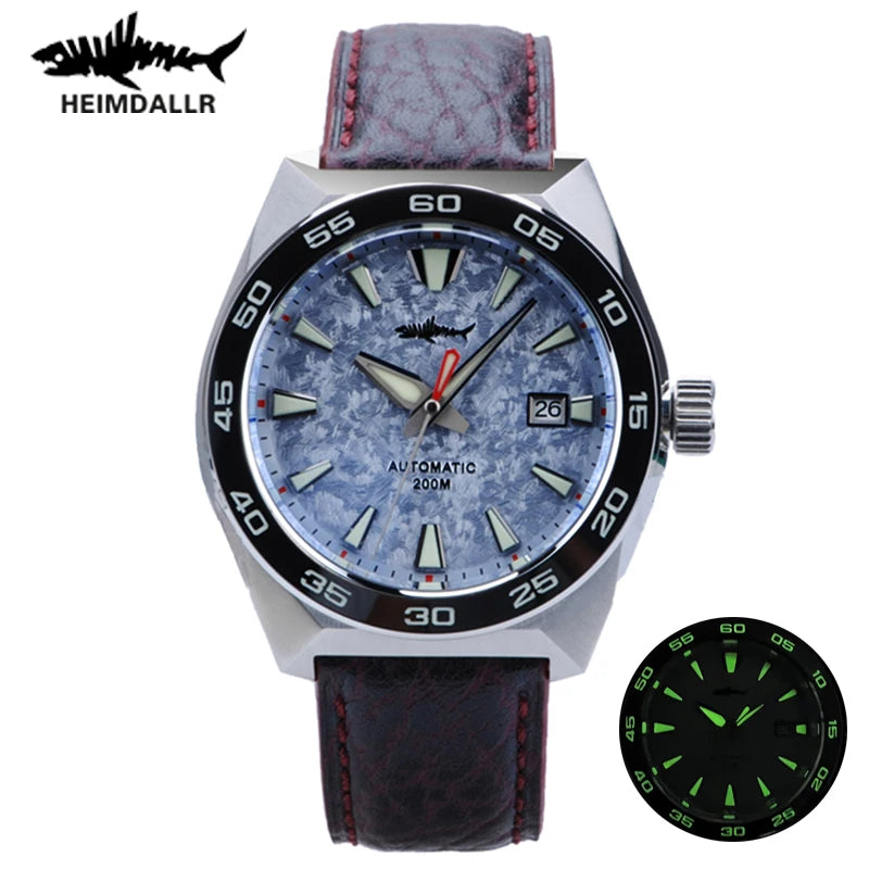 NorthChrono Heimdallr men's watch featuring a large silver-tone case, textured blue dial with prominent hour markers, red-tipped seconds hand, date window at 3 o'clock, and a black leather strap with red stitching; includes glowing dial detail for luminescence.