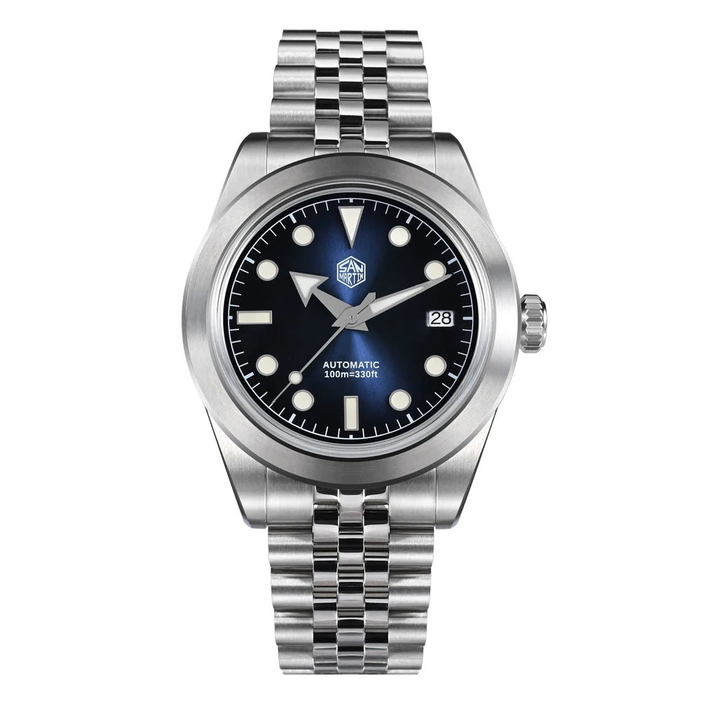 NorthChrono stainless steel automatic watch with a blue dial, luminous hour markers and hands, date window at 3 o'clock, and textured steel bracelet, marked with "100m" for water resistance up to 100 meters.