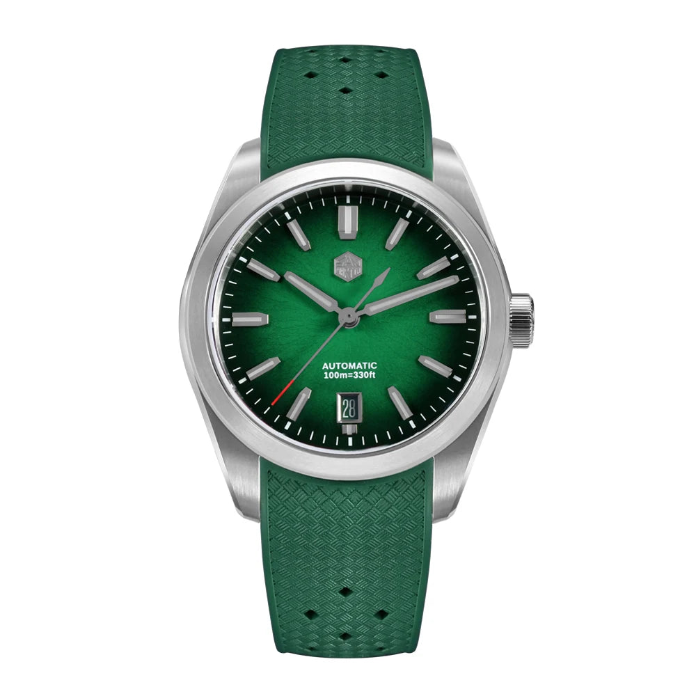 NorthChrono automatic watch with a green dial, featuring hour markers, luminous hands, and a date display at the bottom. It has a stainless steel case and a green rubber strap, with a water resistance of 100m/330ft.