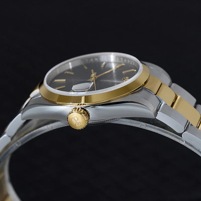 NorthChrono sleek two-tone watch featuring a dark gray dial with gold hour markers and hands, silver and gold stainless steel case and bracelet, with a crown for time adjustment on the side.