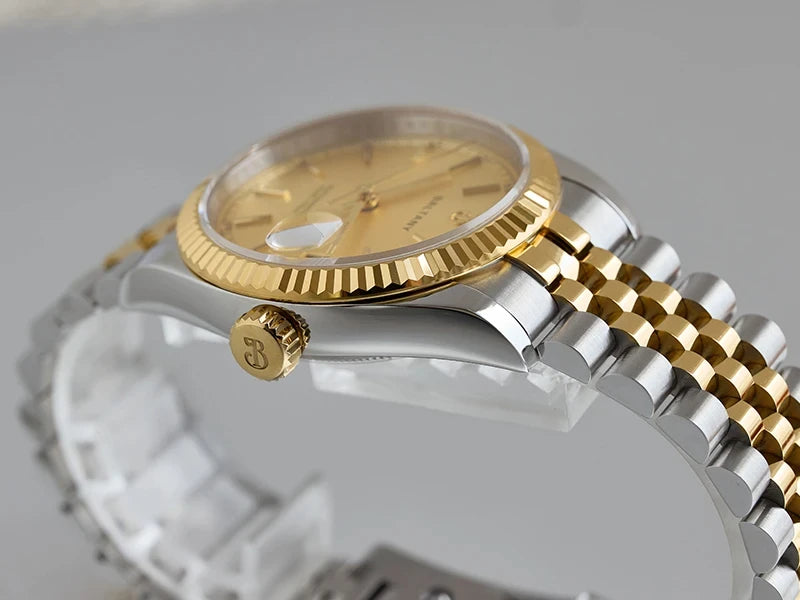 NorthChrono luxury watch featuring a two-tone gold and silver finish, gold dial, fluted bezel, and linked bracelet, showcasing an elegant design suitable for formal occasions.