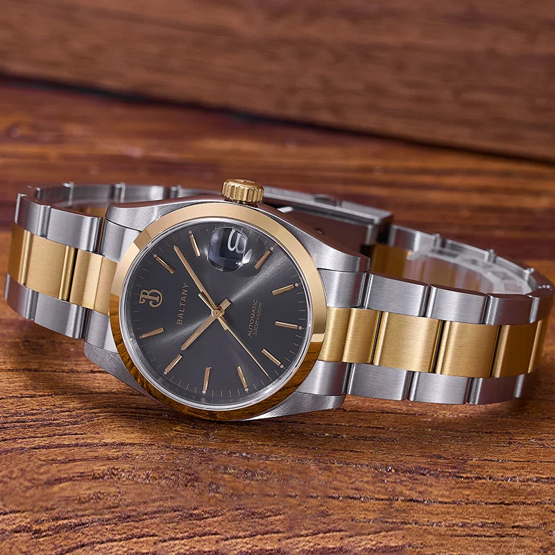 NorthChrono elegant dual-tone wristwatch featuring a round case with a dark gray dial, silver and gold bracelet, and a crown for adjustments, set against a wooden surface background.