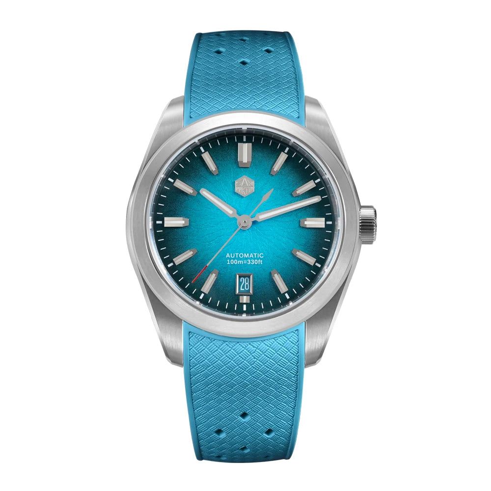 NorthChrono automatic watch featuring a striking turquoise dial, date window, and stainless steel case. The sporty design is complemented by a blue rubber strap and contrasting hour markers and hands, ideal for modern styling.