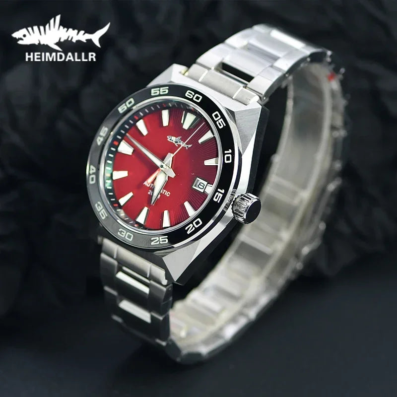 NorthChrono stylish wristwatch with a red dial and luminous hour markers, silver stainless steel strap, rotating bezel, and date display at 3 o'clock; brand name "HEIMDALLR" visible, set against a dark textured background.