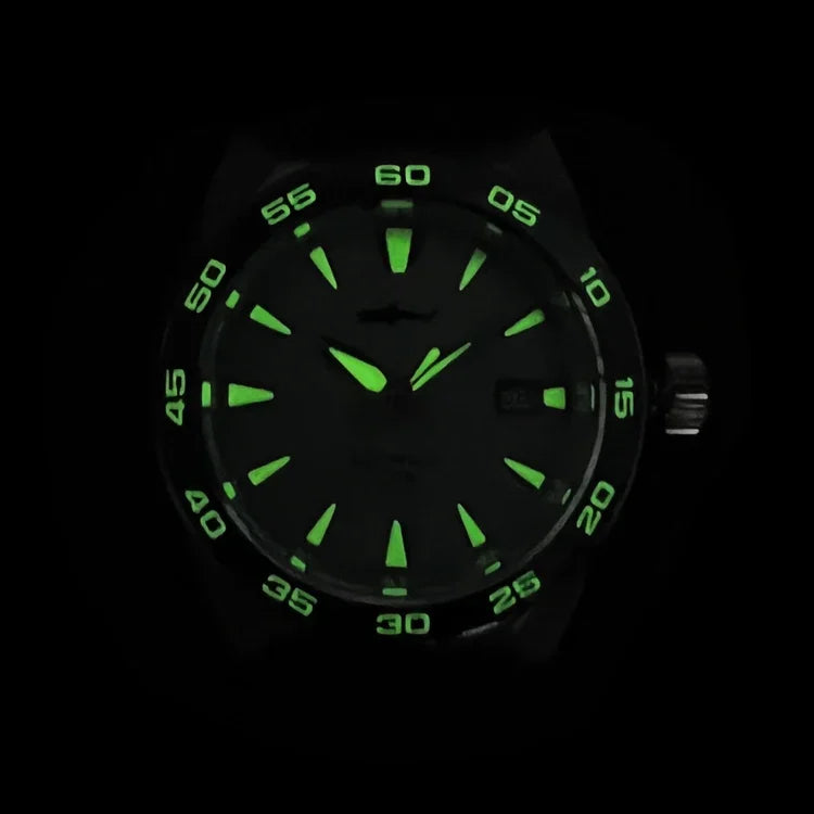 NorthChrono men's watch with a luminescent green dial, featuring illuminated hour markers and hands, set against a dark background, designed for visibility in low-light conditions.