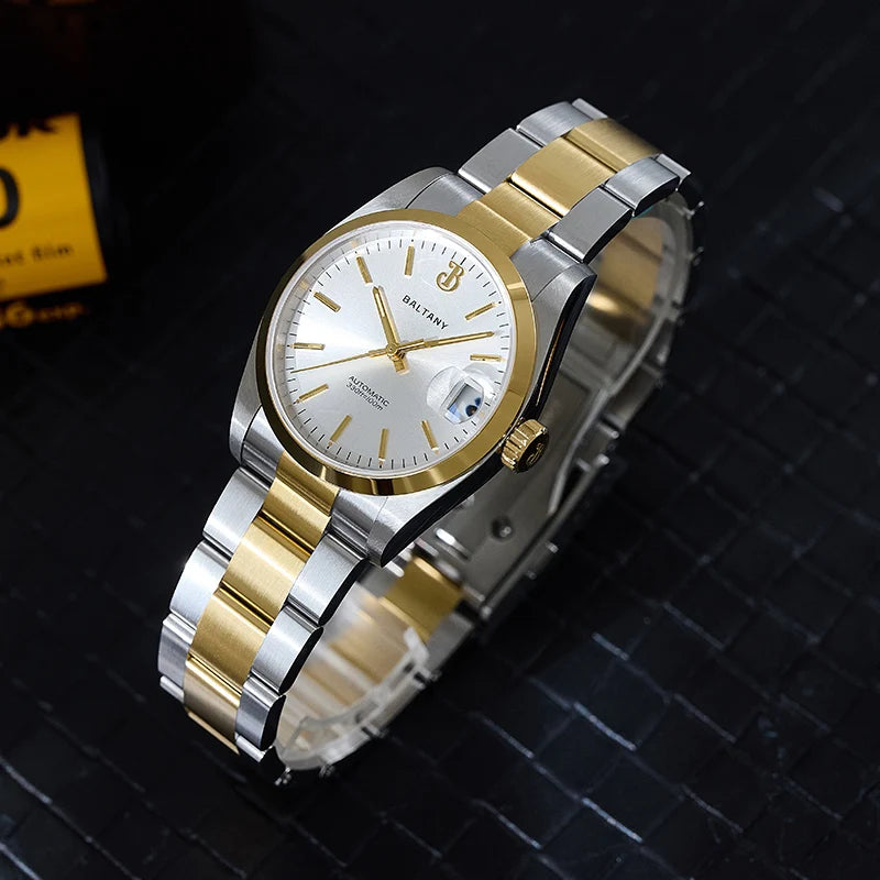 NorthChrono elegant two-tone watch featuring a round case with a silver dial, gold hour markers, and a date window at 3 o'clock. The silver and gold bracelet complements its classic design against a dark background.
