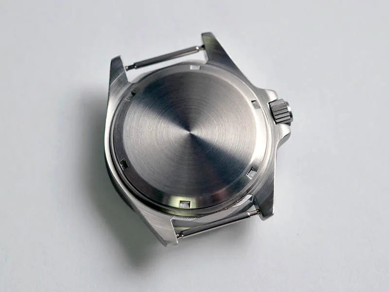 NorthChrono stainless steel watch caseback with a brushed finish, featuring lugs for strap attachment and a crown on the right side for time or date setting. Ideal for those seeking a durable and functional timepiece.