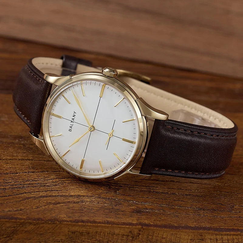 NorthChrono stylish wristwatch featuring a white dial with gold accents, round gold-toned case, and brown leather strap, displayed on a wooden surface, emphasizing its elegant design.