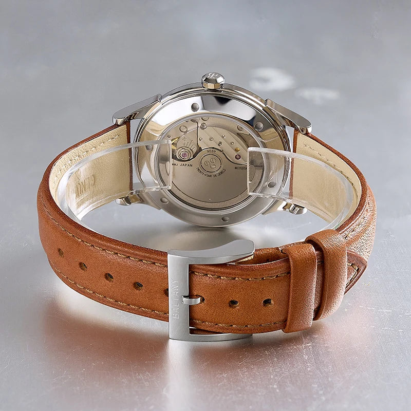 NorthChrono classic mechanical watch with a clear case back displaying intricate movements, brown leather strap with a metal buckle, ideal for elegant styles.